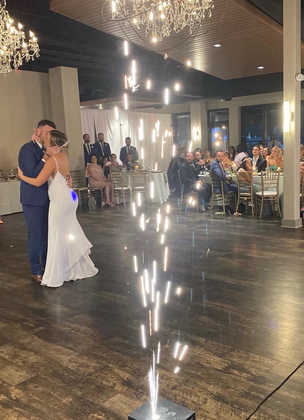 Bride and groom sharing first dance with cold spark fountain effects by NBT