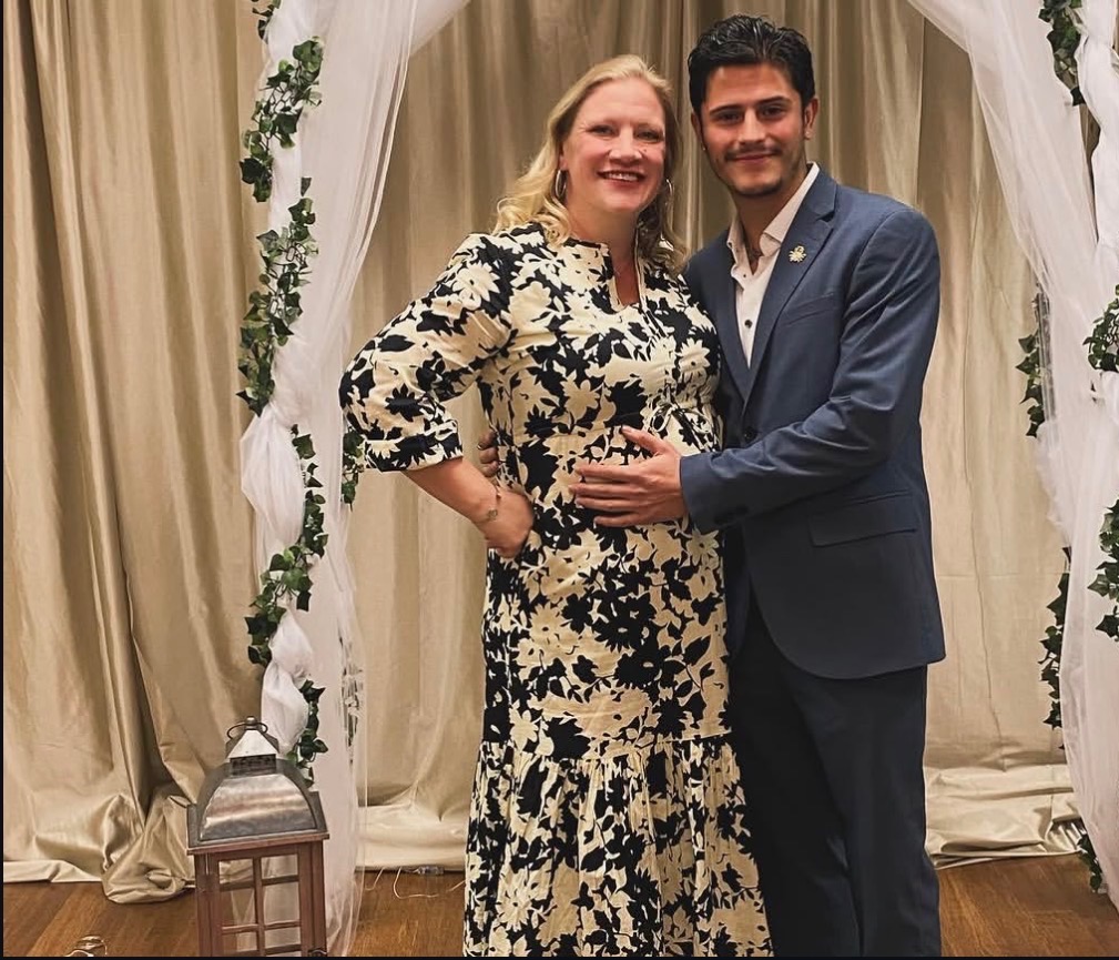 NBT Entertainment host with a guest at a formal reception